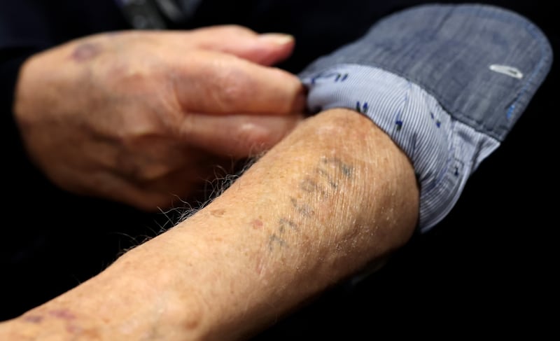 Albrecht Weinberg's prisoner number, 116927, tattooed on his arm at the Auschwitz concentration camp in April 1943. Photograph: Friedemann Vogel/EPA