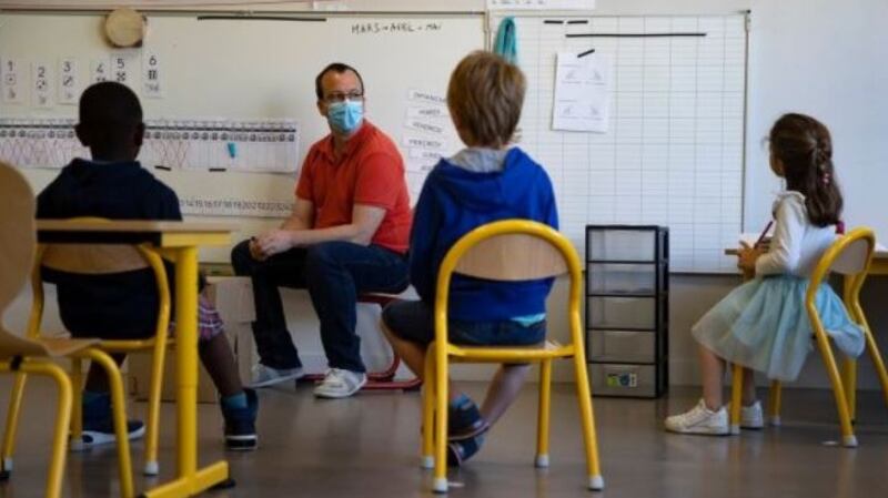 Children attend class while practising social distancing in France, May 25th. Photograph: Epa/Ian Langsdon