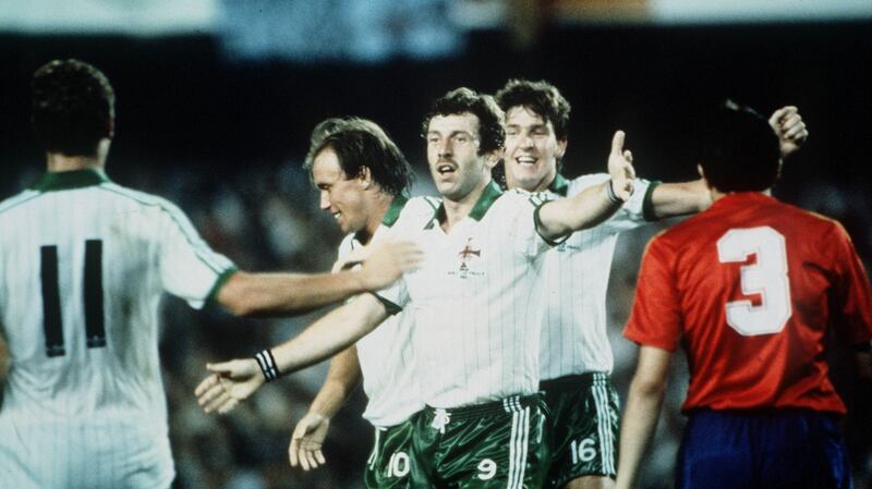 Northern Ireland’s Gerry Armstrong is congratulated by team-mate Billy Hamilton after scoring the only goal of the game against the hosts Spain at the 1982 World Cup. Photograph: Bob Thomas/Getty Images