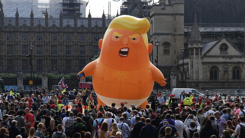 The “Donald Trump Baby Blimp” balloon flies over Parliament Square during a protest in London on Friday. Photograph: Andy Rain/EPA