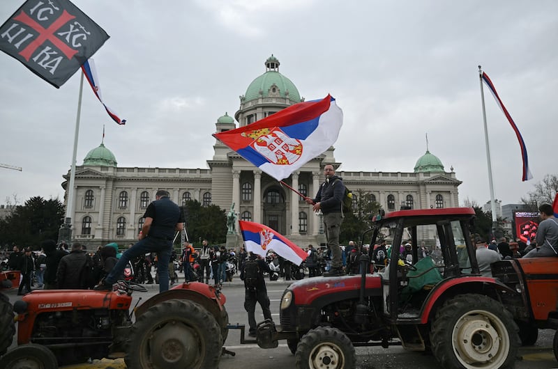 Protesters gather in front of the National Assembly building in Belgrade on Saturday. Photograph: Andrej Isakovic/AFP