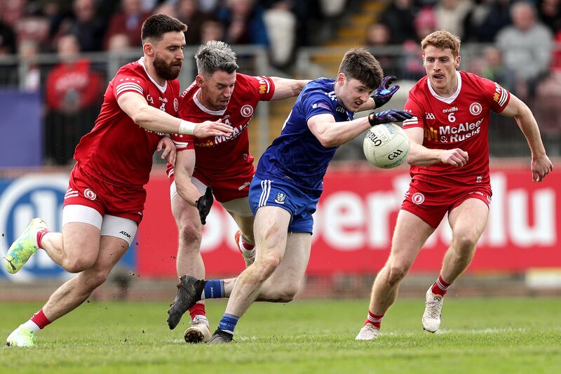 Monaghan's Stephen O’Hanlon comes under pressure from Tyrone's Pádraig Hampsey, Matthew Donnelly and Peter Harte. Photograph: Laszlo Geczo/Inpho