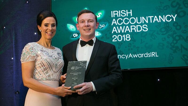 Tom O’Reilly, Head of Partnerships, Linked Finance presents the Accountant of the Year - Industry award to Monica Kelly, CDE Global