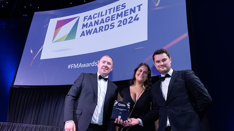 Dinny Crowe, enterprise operations director, UK & Ireland of CBRE, presents the excellence in sustainability – in-house award to Shane Faulkner and Siobhan Pierce, KPMG