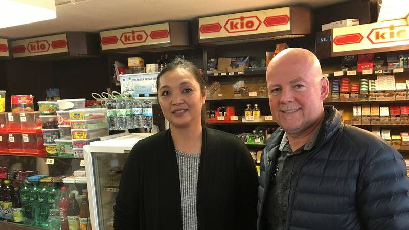 Vietnamese woman Nguyen, one of the boat people 40 years ago, has watched closely the 2015 refugee crisis and local reaction. Right, Irishman Paul Cahill, who came to Germany 31 years ago and now runs his own business in Düsseldorf. Photograph: Derek Scally