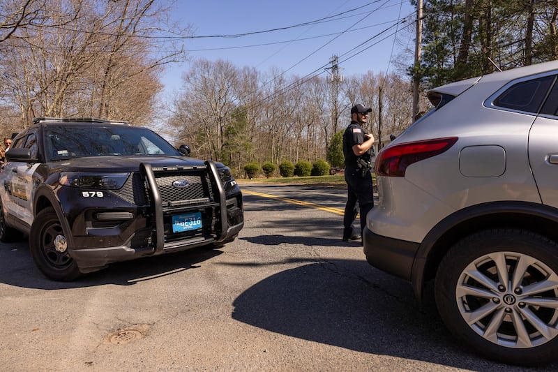  Police block a road a distance from the  Massachusetts home of Jack Teixeira, who investigators believe is linked to a trove of leaked classified US intelligence documents. Photograph: Alex Gagne/The New York Times
                      