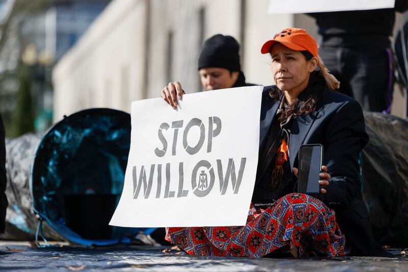 Climate activist hold a demonstration to urge President Joe Biden to reject the Willow Project at the US Department of Interior last November in Washington, DC. Photograph: Jemal Countess/Getty Images for Sunrise AU