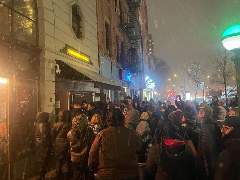 People gather outside the Bowery Ballroom where Paul McCartney’s surprise show was held in New York. Photograph: Jake Coyle/AP