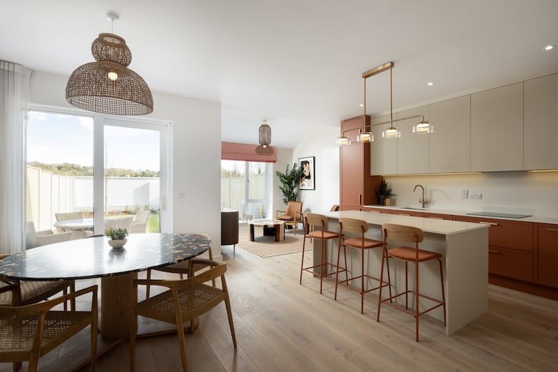 Kitchen and dining area in three-bedroom houses