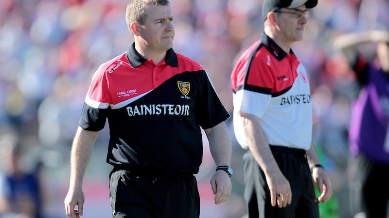 Down manager James McCartan with Tyrone manager Mickey Harte in the 2010 Ulster final. Photograph: Morgan Treacy/Inpho