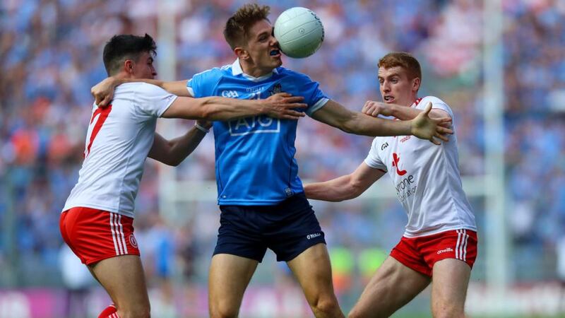 Dublin’s Michael Fitzsimons battles with Tyrone’s Lee Brennan and Peter Harte at Croke Park. Harte, like most of Tyrone’s big names, was kept very quiet.  Photograph: Tommy Dickson/Inpho