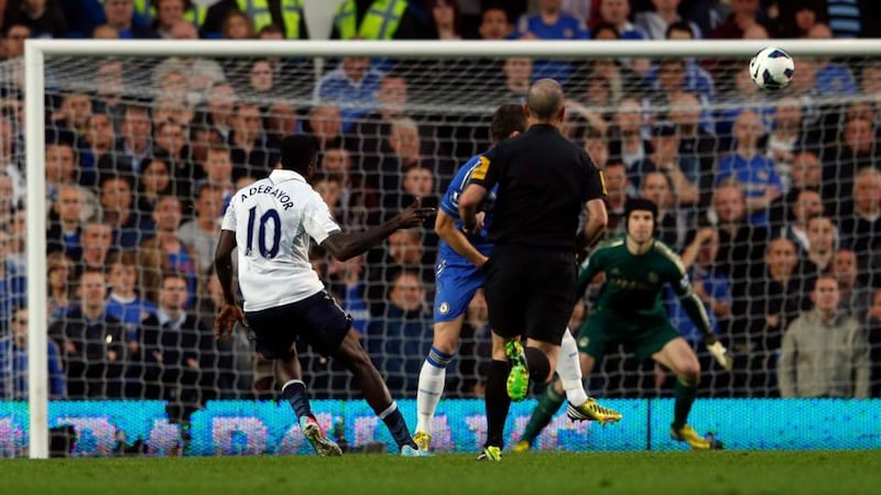 Tottenham Hotspur’s Emmanuel Adebayor (left) scores their first at Stamford Bridge. Photograph: Eddie Keogh/Reuters