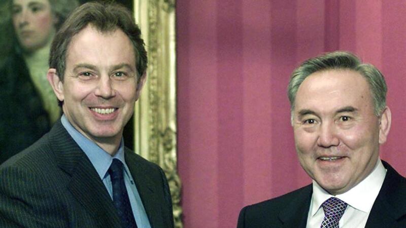 Tony Blair greets Kazakhstan’s President Nursultan Nazarbayev in Downing Street in 2000. “Blair joined Nazarbayev as a cheerleader in 2011 on a deal worth £8 million a year. It is an all-embracing public relations job for the ruthless tyrant; one year Blair is fronting up a video panegyric for the President, the next he is writing words for a speech for in which Nazarbayev will explain to Cambridge students the following month why Kazakh police shot down 15 striking oil workers.” Photograph: Kieran Doherty/AFP/Getty Images