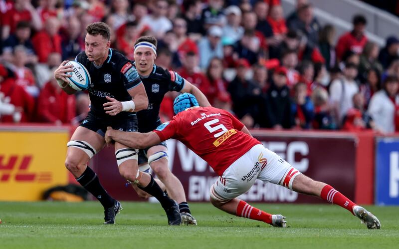 Munster's Tadhg Beirne tries to take down Glasgow's Jack Dempsey. Photograph: Dan Sheridan/Inpho