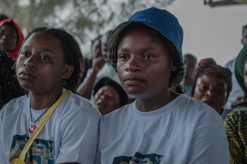 The children of Jean de Dieu Balezi, the celebrated boxer known as Kibomango, at his funeral in Goma. Photograph: Guerchom Ndebo/New York Times
                      