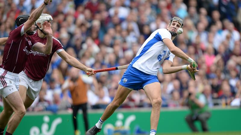 Galway’s Aidan Harte and Daithí  Burke in action against Waterford’s  Maurice Shanahan. Burke missed Galway’s league campaign and won a club football All-Ireland medal with Corofin. .Photograph: Dara Mac Dónaill