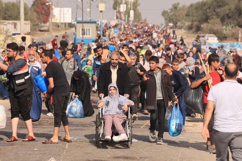 Palestinians fleeing Gaza City and other parts of northern Gaza on Thursday. Photograph: Mahmud Hams/AFP via Getty Images