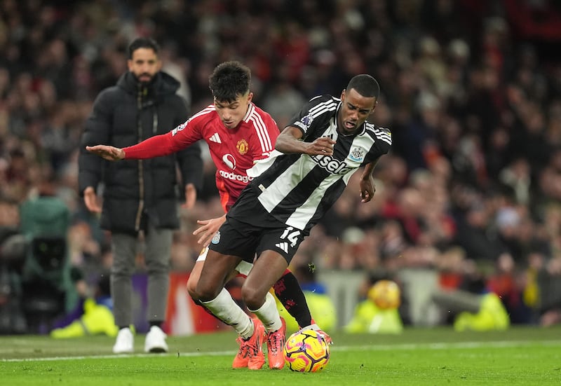 Newcastle United's Alexander Isak in action against Manchester United's Lisandro Martinez. Photograph: Martin Rickett/PA