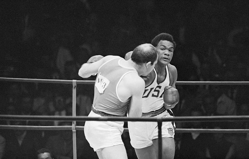 George Foreman fighting Ionas Chepulis of Russia during their heavyweight final bout at the Mexico City Olympics in 1968. Foreman won when the referee stopped the fight in the second round. Photograph: Bettmann