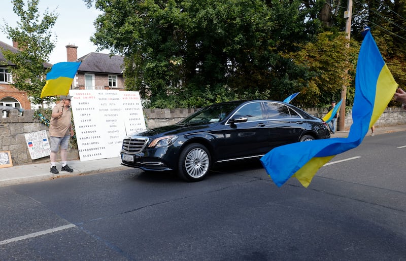 Protesters in support of Ukraine shout at a car believed to be carrying the Russian ambassador to Ireland Yuri Filatov. Photograph: Alan Betson