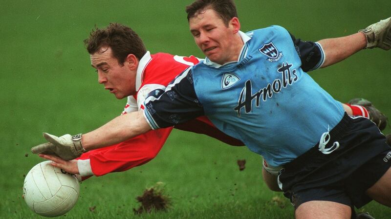 Gavin in action for Dublin against Brian Philips of Louth in 1998. Photograph: Inpho