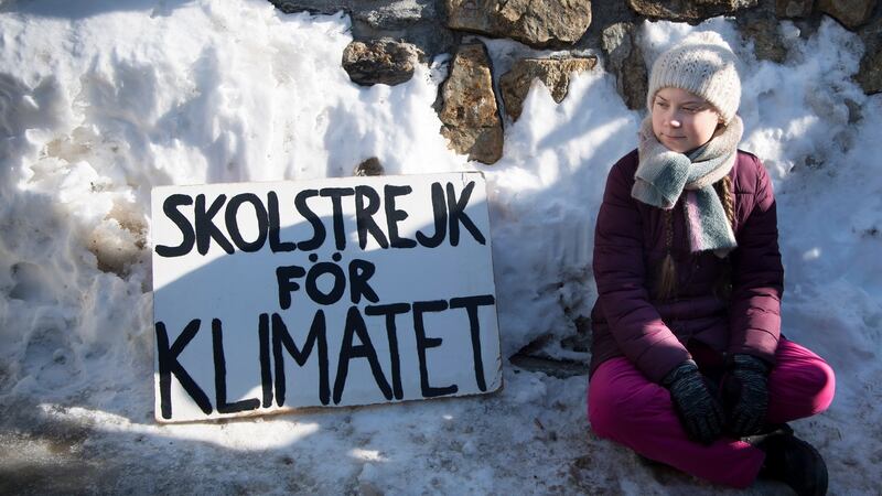 Swedish climate activist Greta Thunberg (16) with a placard reading ‘School Strike for Climate’,  on the last day of the  World Economic Forum in Davos, Switzerland. Photograph: Laurent Gillieron/EPA