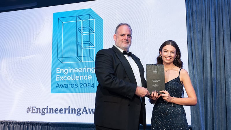 Graham Heaslip, awards judging coordinator, presents the engineering project of the year award to Emer Lyster, Luminate Medical