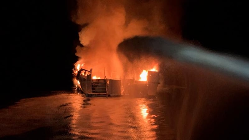 A handout photo made available by the Ventura County Fire Department shows a diving boat on fire off the north side of Santa Cruz Island, California on Monday. Photograph: EPA/Ventura County Fire Department