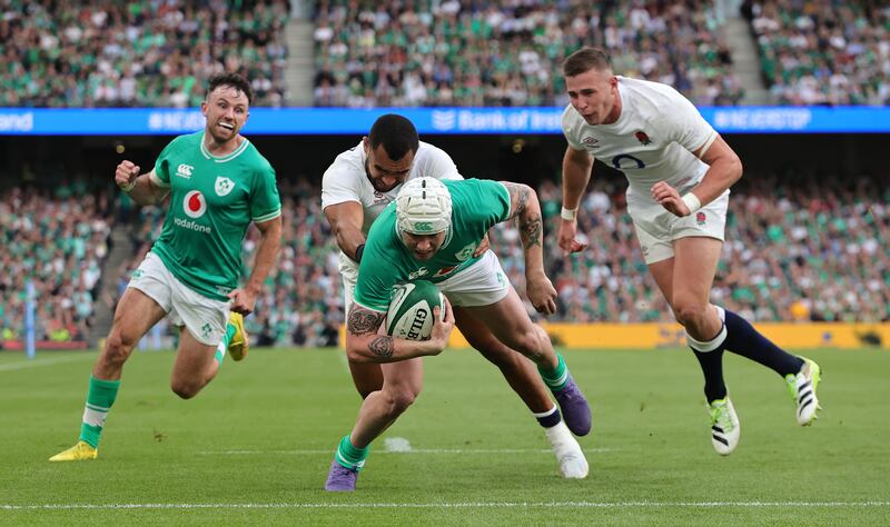 Mack Hansen of Ireland scores a try against England in the August match at the Aviva. Photograph: David Rogers/Getty Images