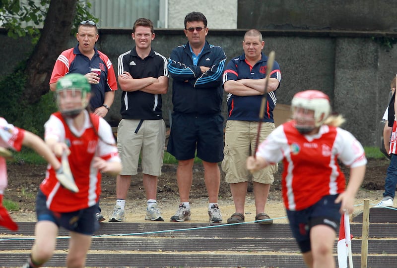 Des Cahill with fellow Cuala members observes a Féile na nGael in 2012. The club has always traditionally been seen as a hurling bastion. Photograph: Donall Farmer/Inpho