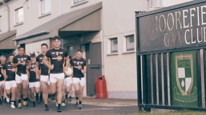 Irish Times journalist Eamon Donoghue (left of centre) and the Underdogs take to the field to face Moorefield. Photograph: TG4 grab