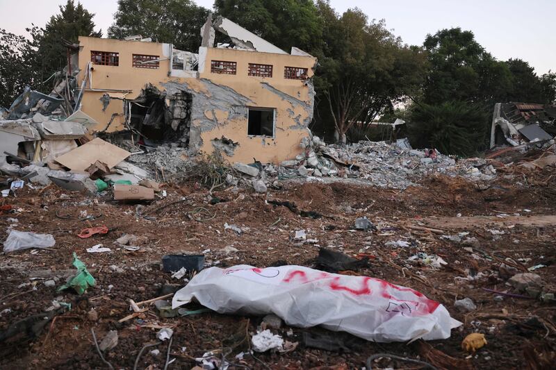 An Israeli victim of last weekend's inflitration by Palestian militants at Kibbutz Be'eri near the border with Gaza. Photograph: Menahem Kahana/AFP via Getty 