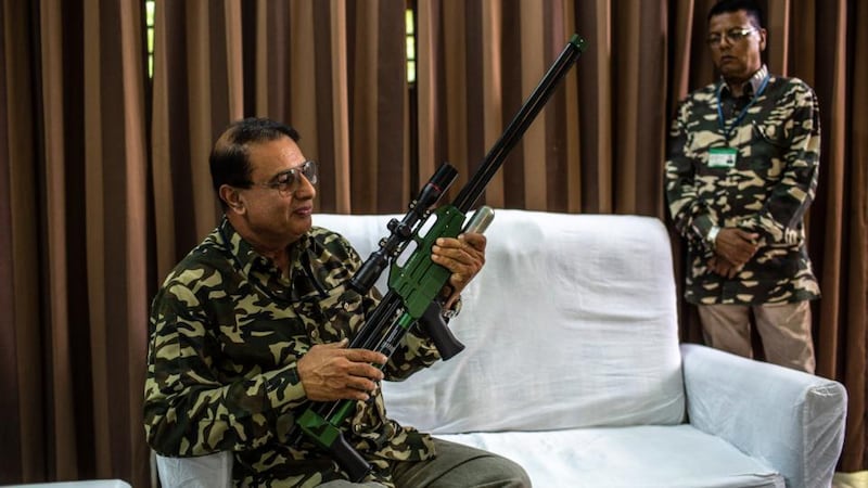 Calvin Klein Obsession: Shafath Ali Khan, a forest-service sharpshooter. Photograph: Bryan Denton/NYT