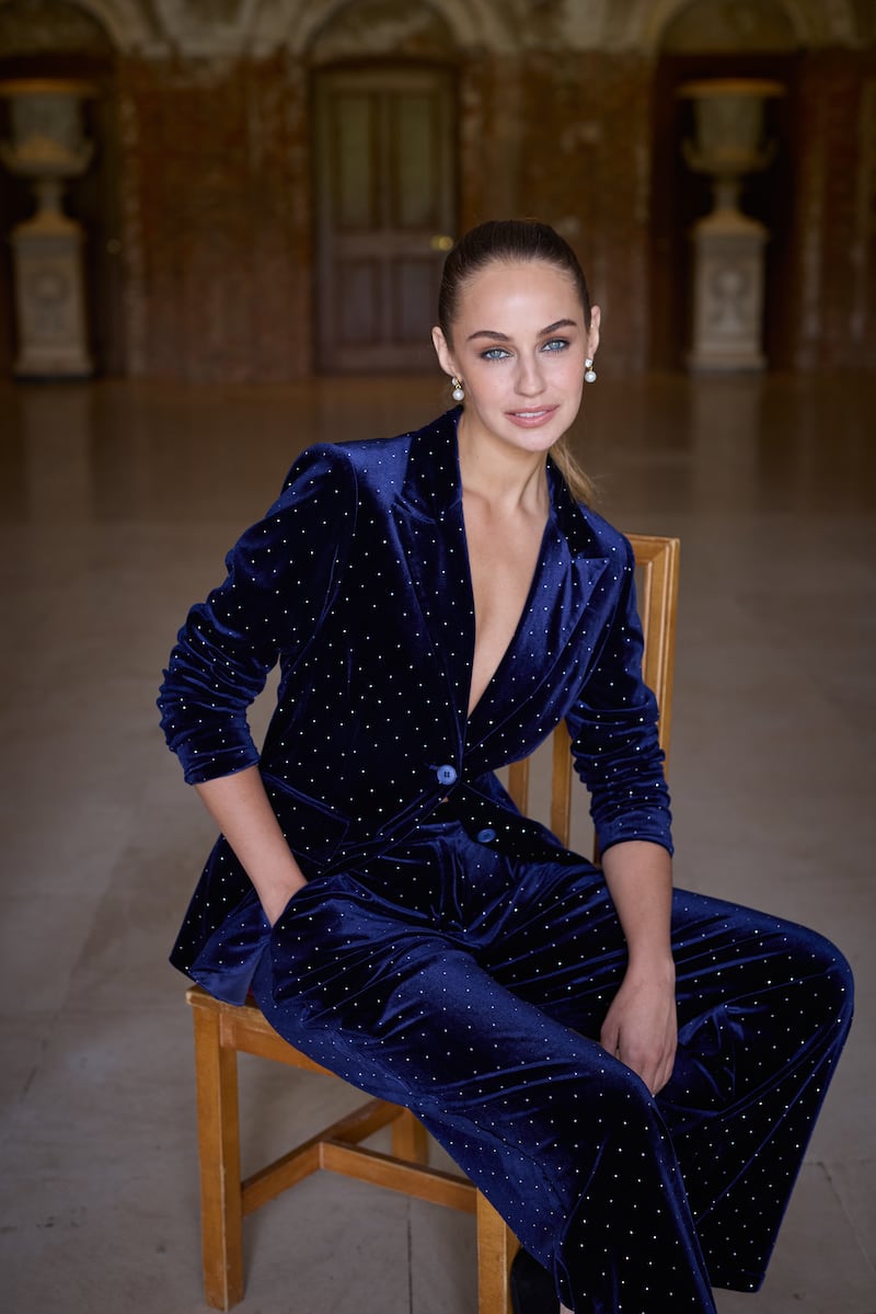 Navy rhinestone velvet jacket, €255, and matching trousers, €135, both by Never Fully Dressed at Avoca. Photograph: Barry McCall