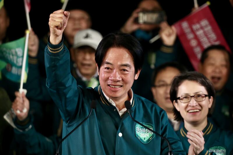 Taiwan's vice president and ruling Democratic Progressive Party presidential candidate for 2024 election Lai Ching-te gestures during a campaign rally in front of the presidential building in Taipei. Photograph: Richie B Tongo/Shutterstock