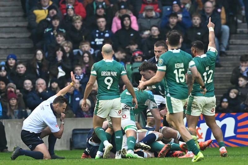 New Zealand referee James Doleman signals a try for Ireland's Caelan Doris against Scoltland. Photograph: Andy Buchanan/AFP via Getty Images