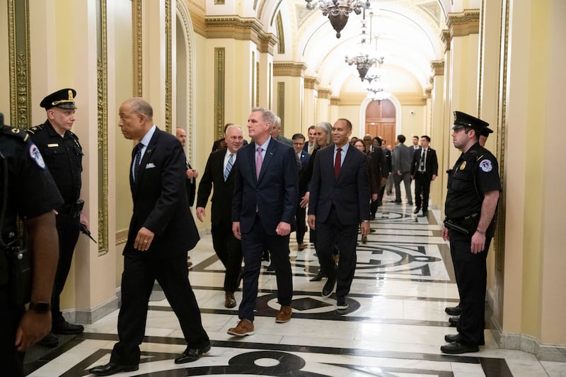 Kevin McCarthy escorted into the House chamber to be sworn-in as Speaker of the House after 15 rounds of voting. Photograph: Michael Reynolds/EPA