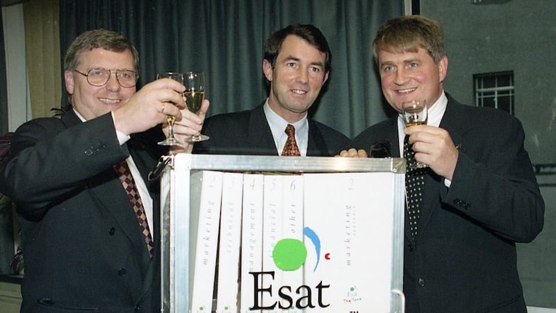 Esat deal: Denis O’Brien (right) with Michael Lowry (centre) and Mar Kare Gustad (left), of Telenor, toast the success of their bid for Ireland’s second mobile-phone licence, in 1995. Photograph: Eric Luke