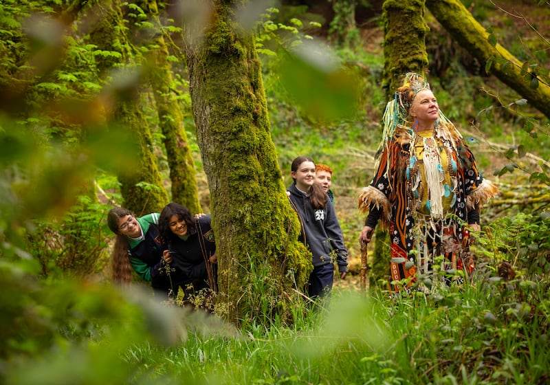 Jill Appadoo, Leoni Fernando, Chloe Kiely and Fionn Hannigan look on as Celtic goddess Noelle Ní Riagáin prepares for Bealtaine