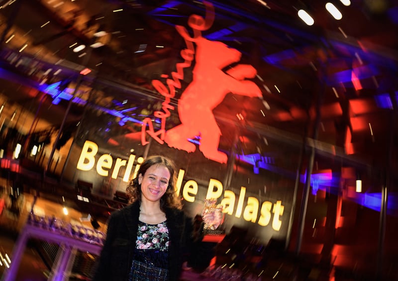 Golden Bear: Mati Diop with her best-film award at Berlin Film Festival 2024. Photograph: Tobias Schwarz/AFP via Getty