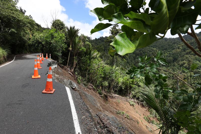 One of many landslide on Mountain Road, one of two access roads in Henderson Valley into Piha on February 15th in Auckland. Photograph: Fiona Goodall/Getty Images