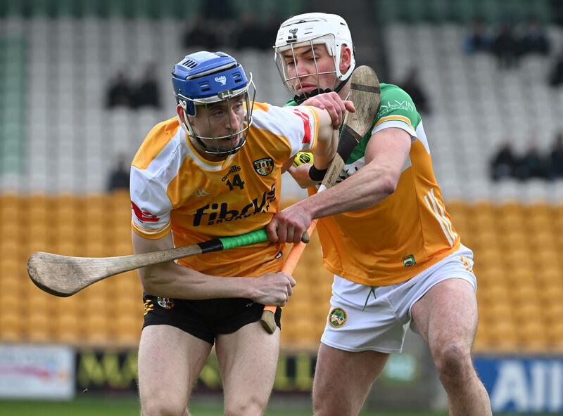 James McNaughton of Antrim and Ross Ravenhill of Offaly during the Division 1B clash at Glenisk O'Connor Park, Tullamore, Photograph: Andrew Paton/Inpho