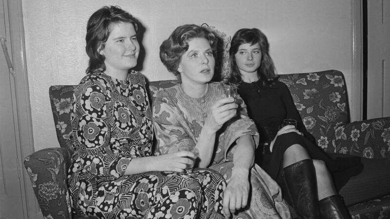 Isabella Rosselini (right) sits with her mother Ingrid Bergman and her sister  Isotta Ingrid (left) in 1971. Photograph: P Felix/Daily Express/Getty Images)