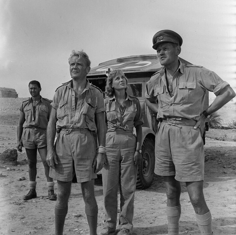 Anthony Quayle, John Mills, Sylvia Syms and Garry Andrews during the making of the film Ice Cold In Alex in 1957. Photograph: Mirrorpix via Getty Images