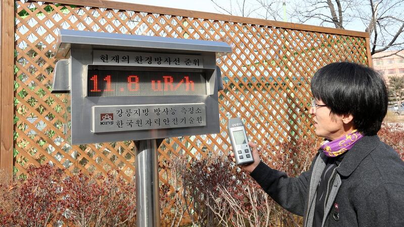 A lab employee from the Korea Institute of Nuclear Safety’s regional office in Gangneung, east of Seoul, checks for radioactive traces in the air, in Gangneung soon after North Korea announced it successfully conducted a hydrogen bomb test. Photograph: EPA