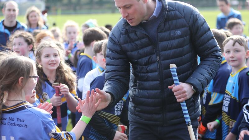 The Duke of Cambridge high fives children at Salthill Knocknacarra GAA Club in Galway. Photograph: Niall Carson/PA Wire