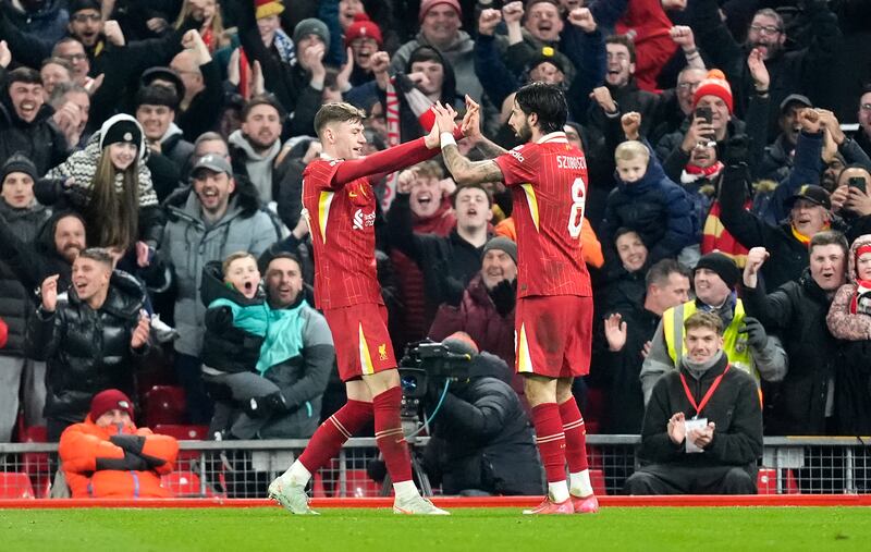 Liverpool's Dominik Szoboszlai (right) celebrates scoring their side's third goal of the game with team-mate Conor Bradley. Photograph: Nick Potts/PA