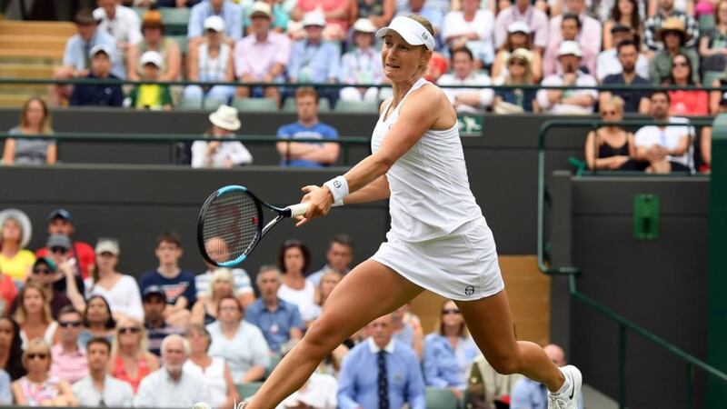 Ekaterina Makarova of Russia returns to Caroline Wozniacki of Denmark in their second-round match during the Wimbledon Championships. Photograph:  Gerry Penny/EPA