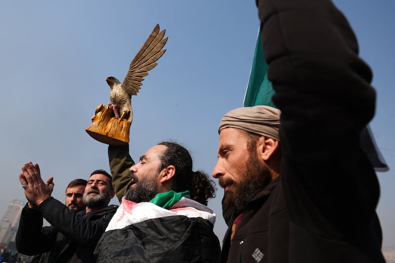 Assad fled to Russia the day before after a lightning offensive spearheaded by Islamist rebels ousted him from power, opening a new chapter in Syria's history after five decades of rule by his clan. Photograph: Omar Haj Kadour/AFP/Getty Images