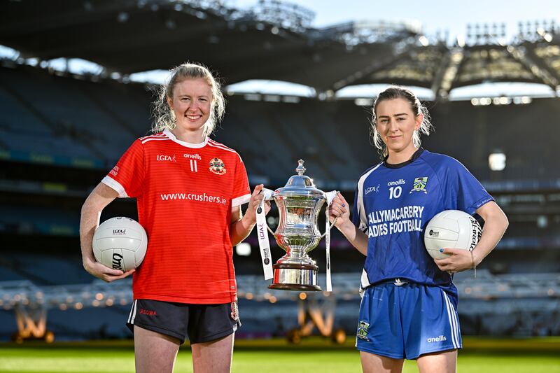 Louise Ward of Kilkerrin-Clonberne, Galway and Aileen Wall of Ballymacarbry, Waterford, with the Dolores Tyrrell Memorial Cup in advance of the All-Ireland club final at Croke Park. Photograph: Sam Barnes/Sportsfile 